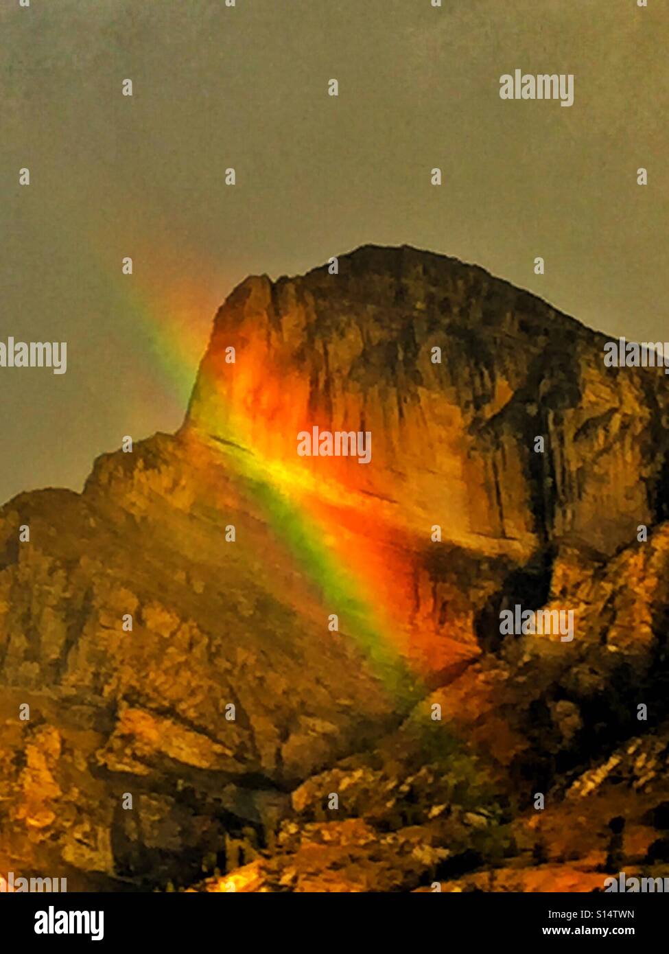 Morning in the Rockies with a mountain rainbow - Smartphone Captured Stock Image
