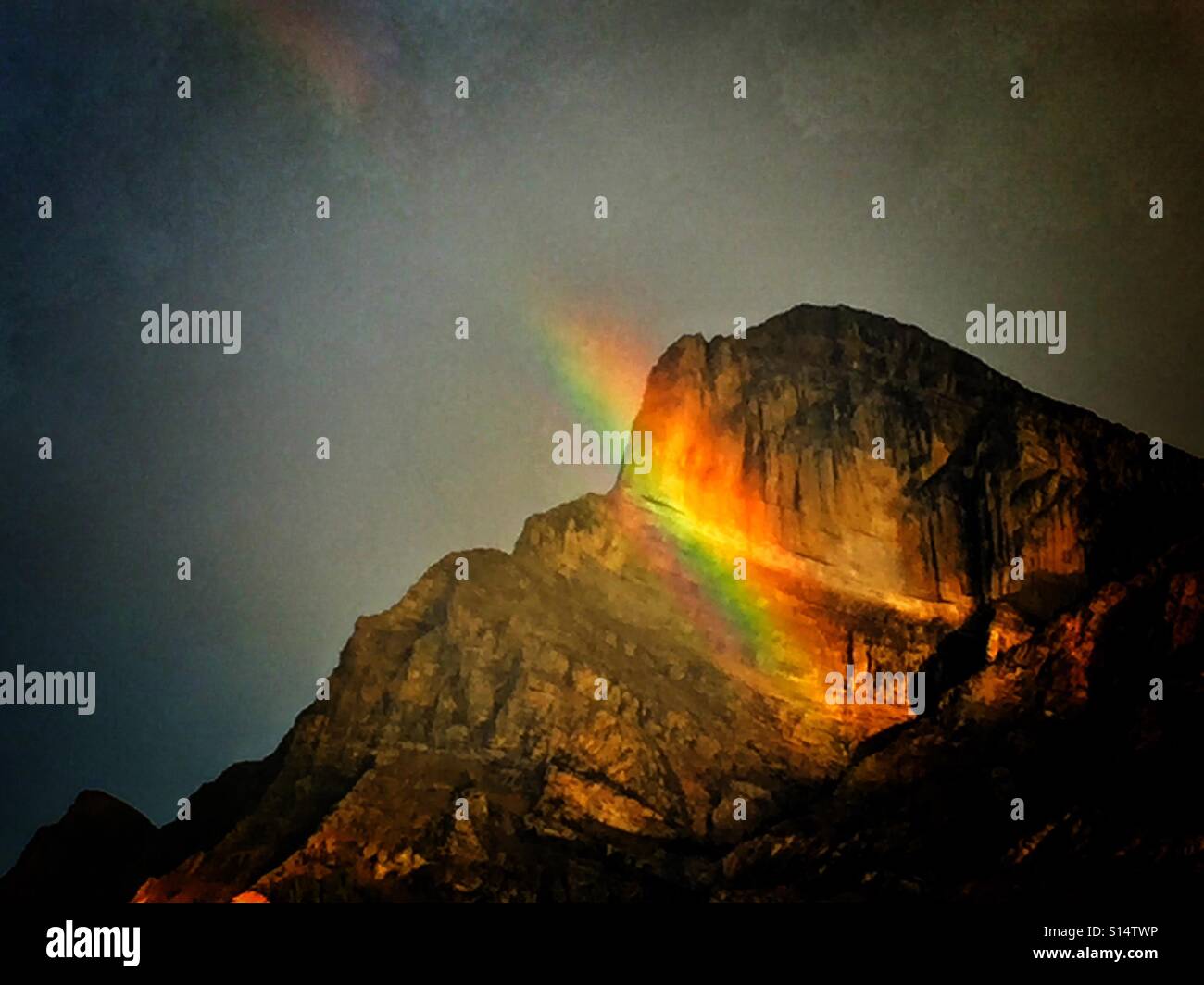 Morning in the Rockies with a mountain rainbow - Smartphone Captured Stock Image