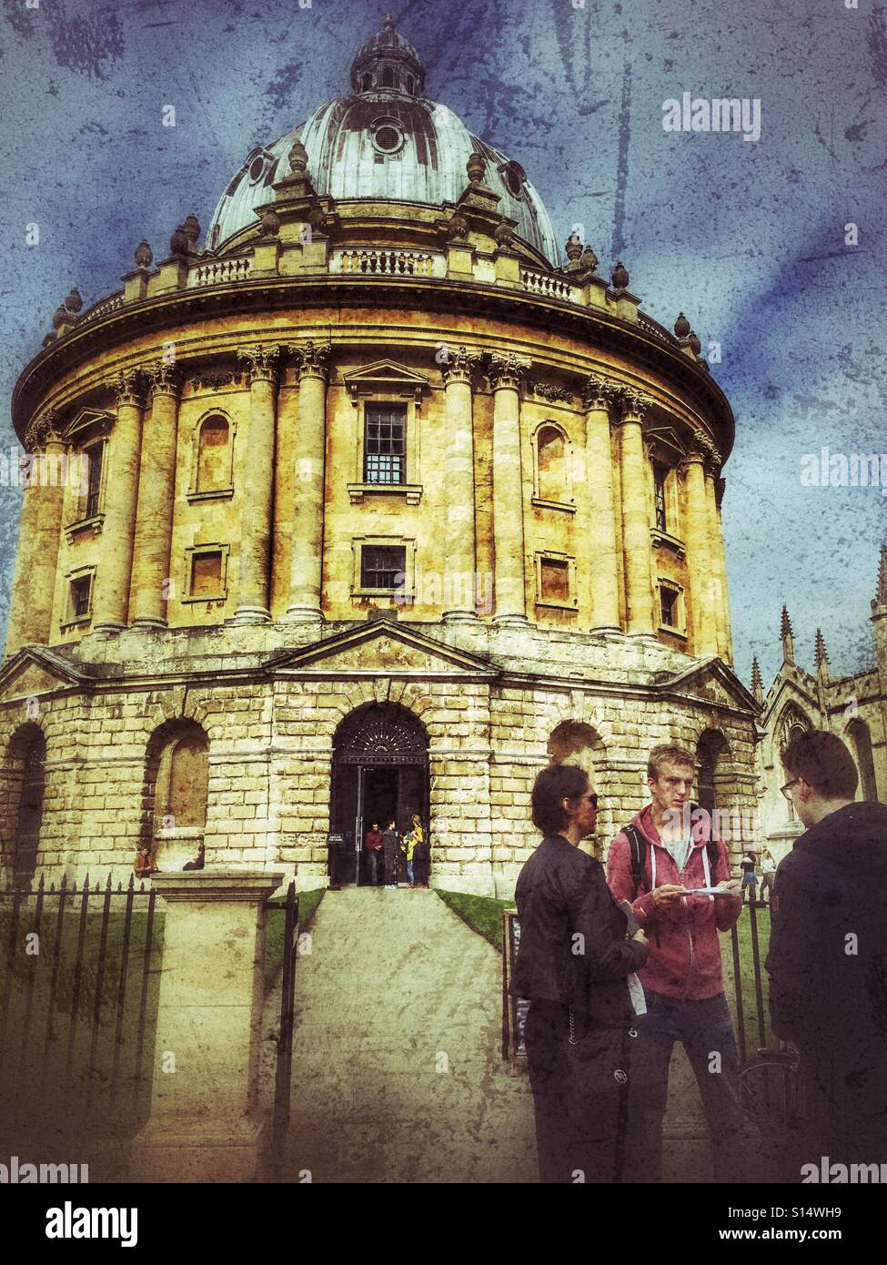Group of tourists outside the Radcliffe Camera, University of Oxford, England - Smartphone Captured Stock Image