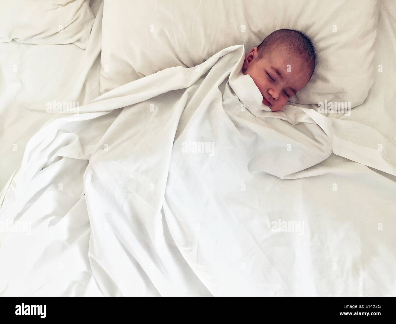 1 month baby sleeping - Smartphone Captured Stock Image