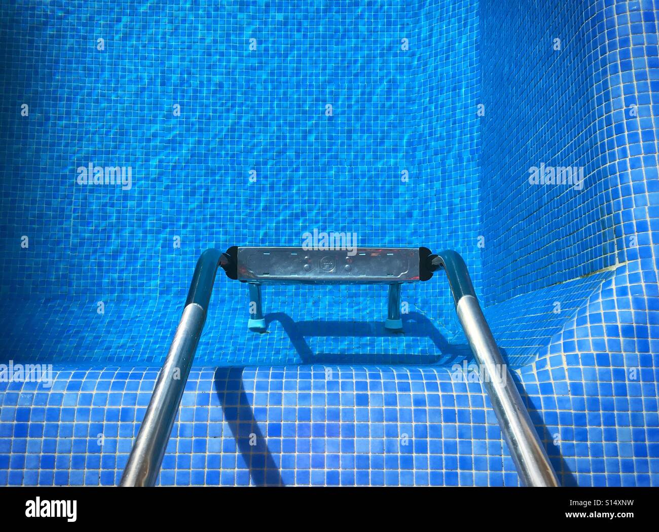 High angle view of steps into swimming pool - Smartphone Captured Stock Image