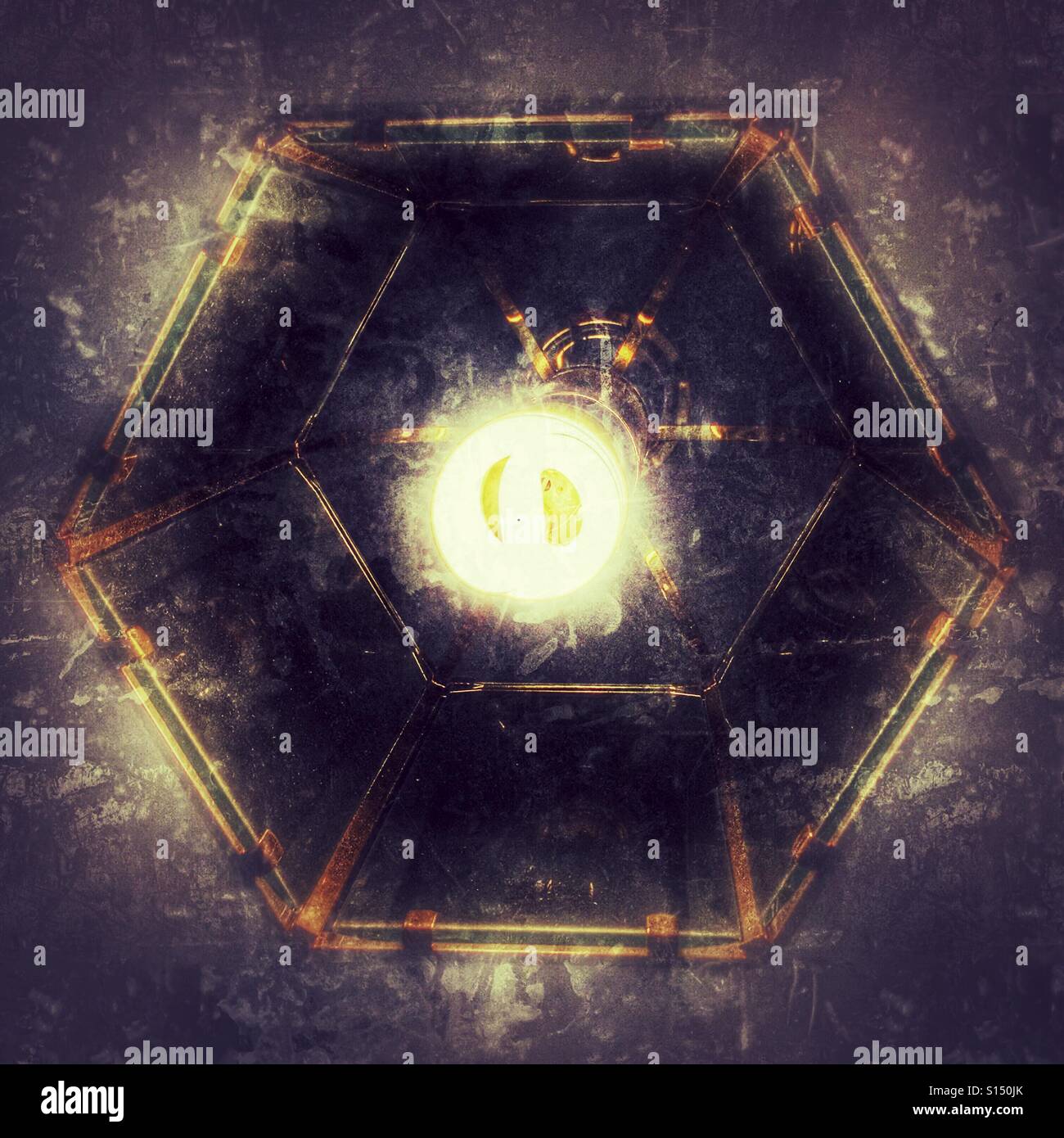 Abstract. Ceiling light, from below. - Smartphone Captured Stock Image