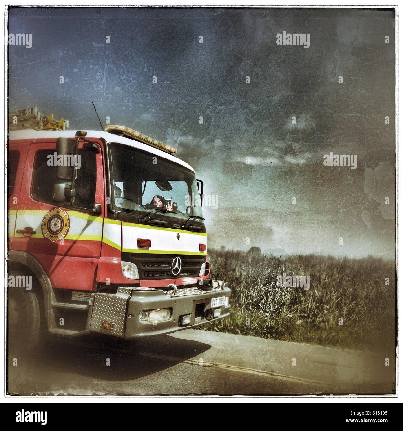 Fire truck on N2 highway near Cape Town, heavy use of filters. - Smartphone Captured Stock Image