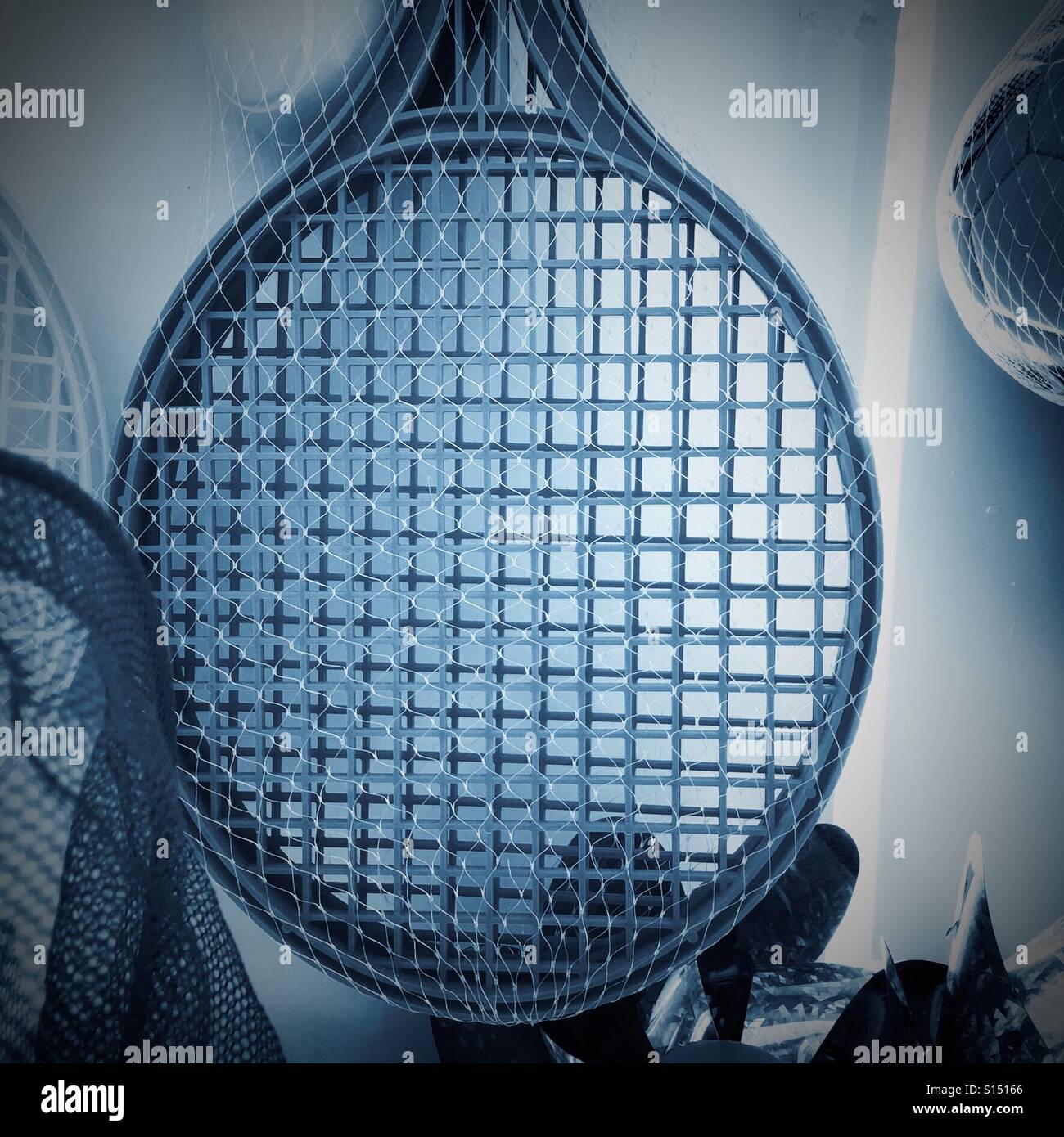 Mesh of a child's plastic racquet - Smartphone Captured Stock Image