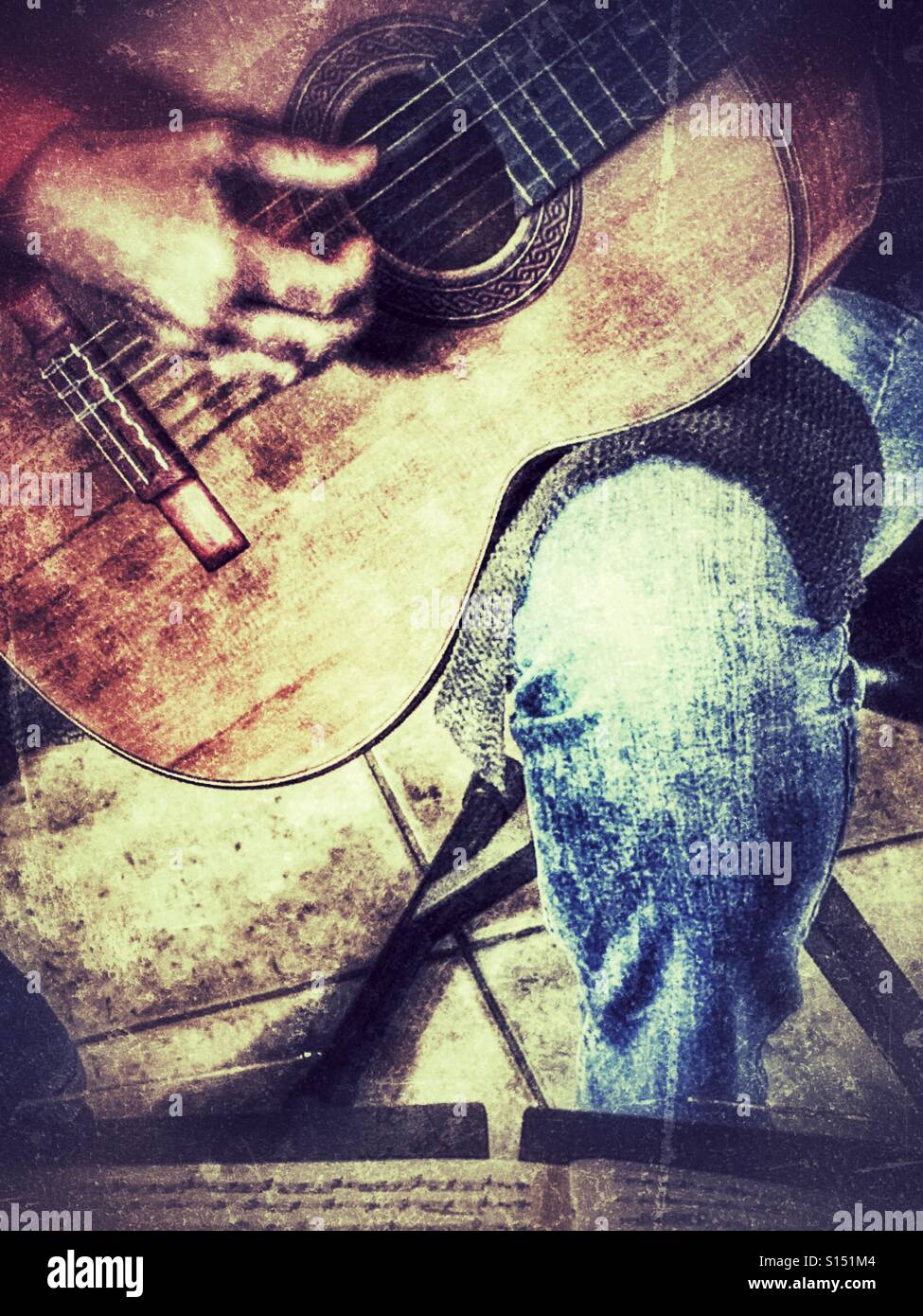 Woman playing a Greg Smallman & Sons classical guitar. - Smartphone Captured Stock Image