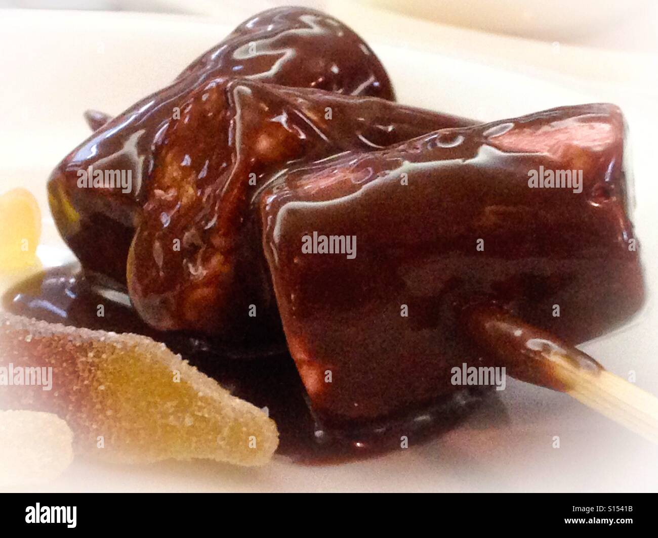 Chocolate covered marshmallow kebab Stock Photo Alamy