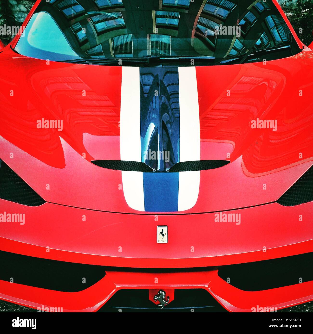 A red Ferrari 458 Speciale car - Smartphone Captured Stock Image