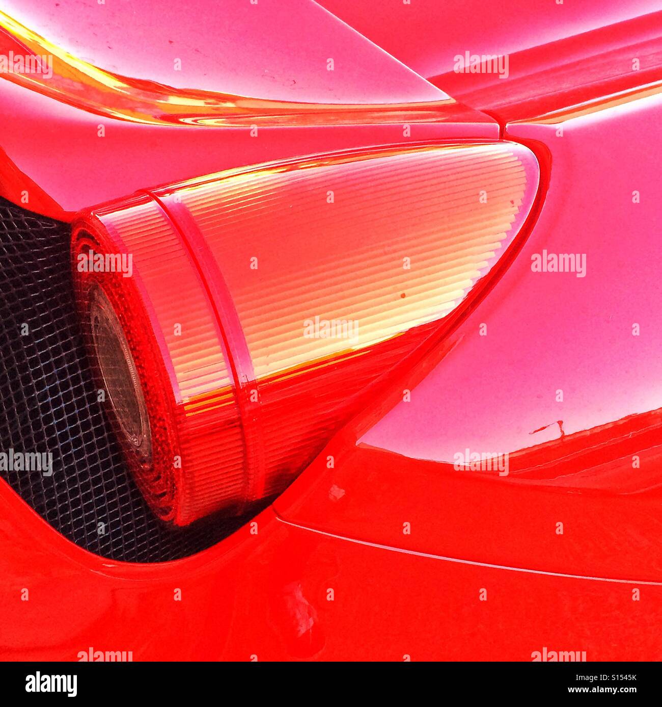 A rear light on a Ferrari 458 Speciale car - Smartphone Captured Stock Image