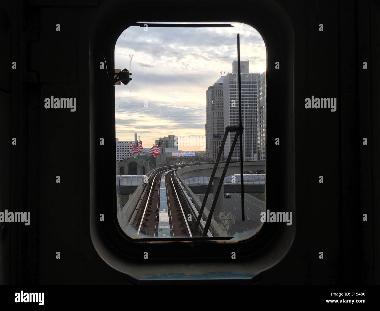 The view out of the window of the Detroit People Mover around sunset. Stock Photo