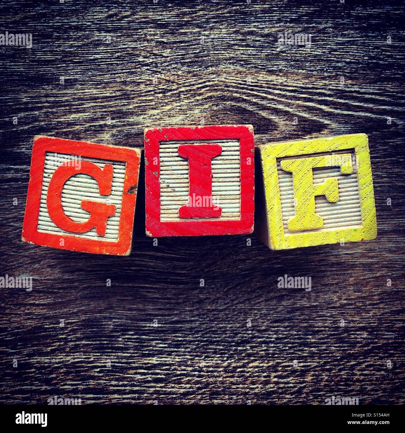 GIF word written with alphabet wood block letter toys Stock Photo