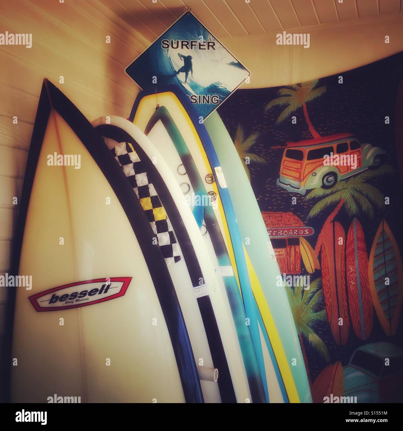 Surfing Life- boards stacked in corner of room in San Diego, CA. Stock Photo