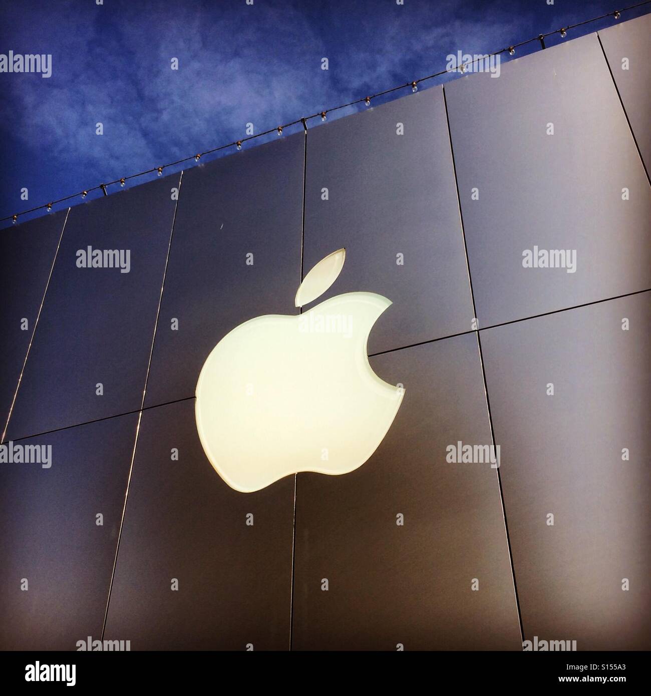 Facade of Apple Store with logo, Seattle Washington, most valuable company in the world - Smartphone Captured Stock Image