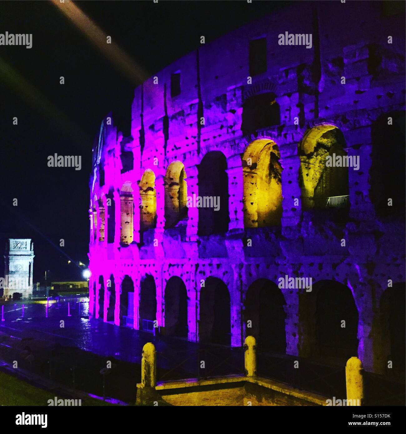 Colosseum in purple illumination Stock Photo