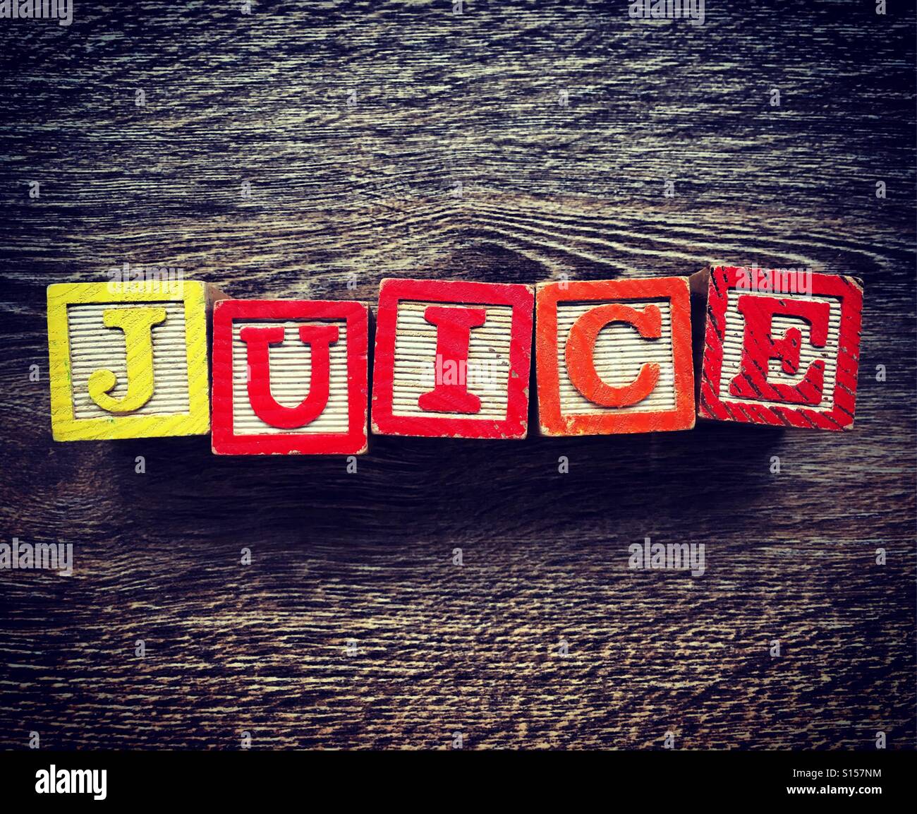JUICE word written with wood block letter toys Stock Photo Alamy