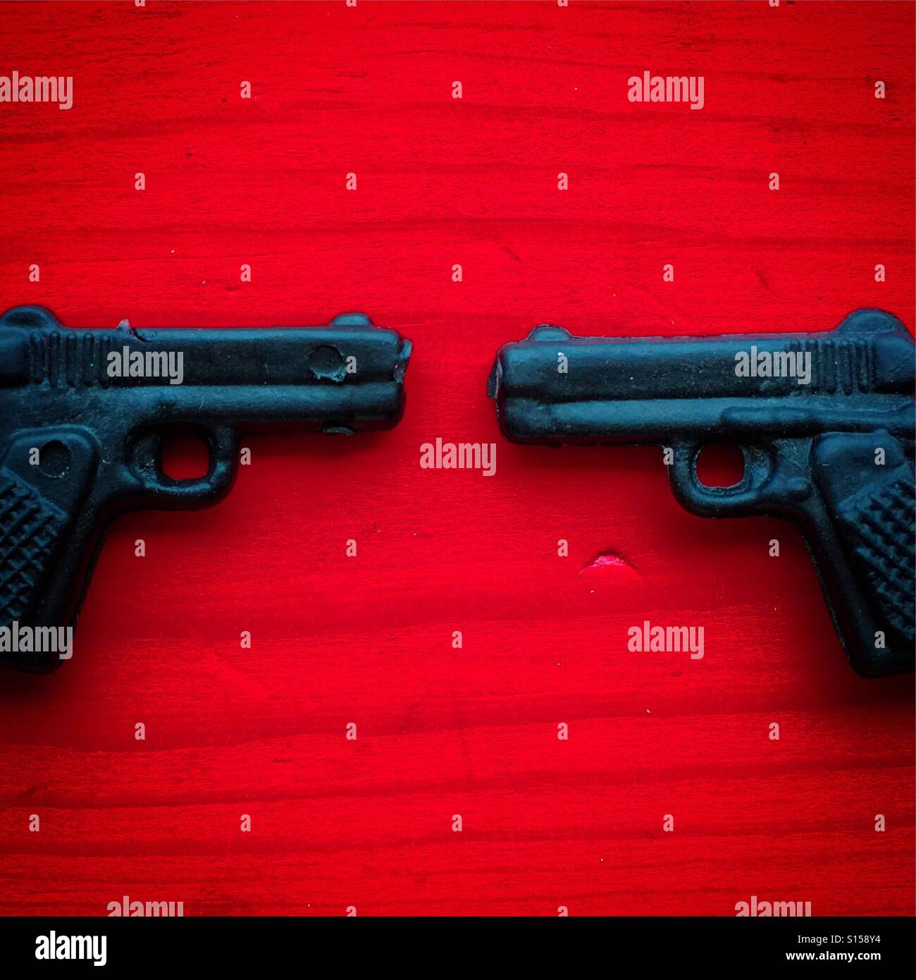 confrontation of 2 guns Stock Photo