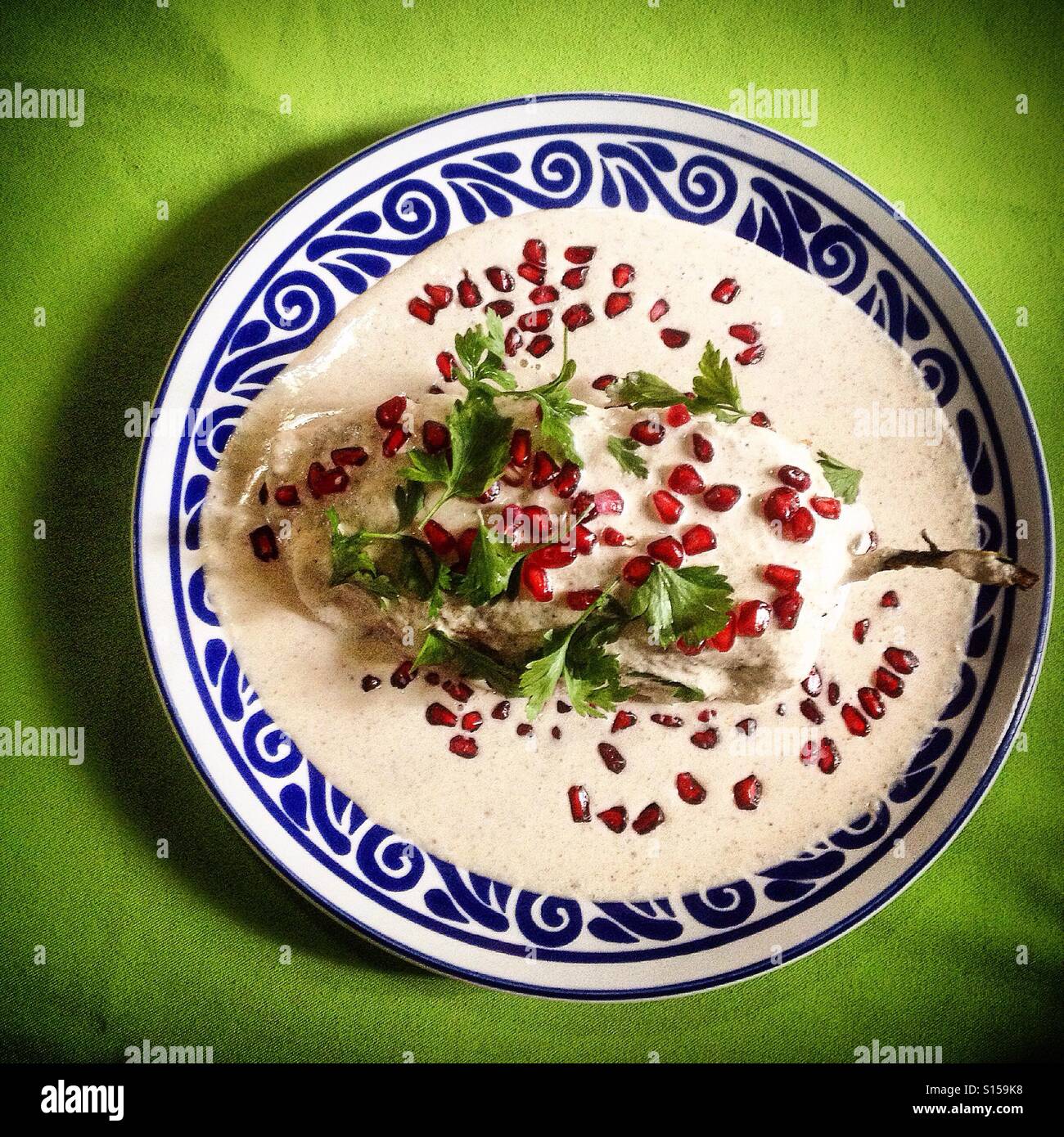 Chiles en nogada plate in Santa Clara restaurant in Puebla de Zaragoza, Mexico - Smartphone Captured Stock Image