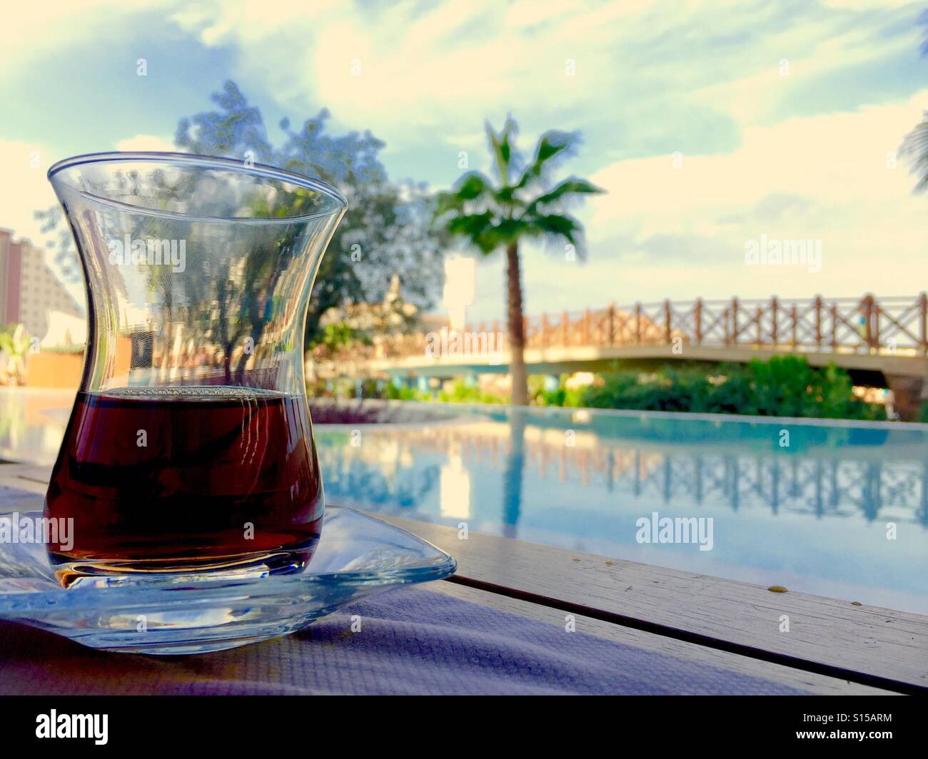 Morning Turkish Tea by the Pool Stock Photo