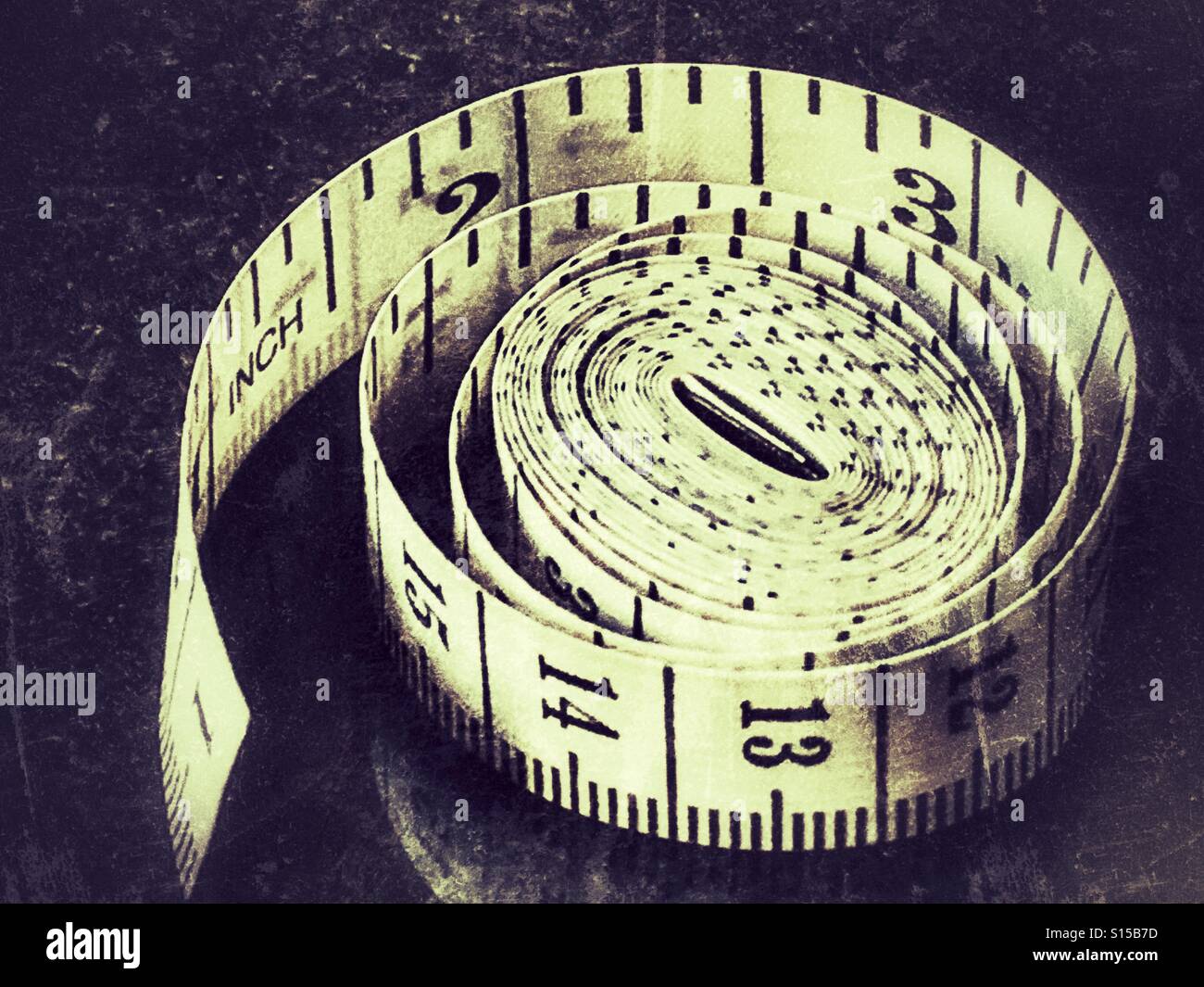 Plastic tape measure, inches and centimetres - Smartphone Captured Stock Image