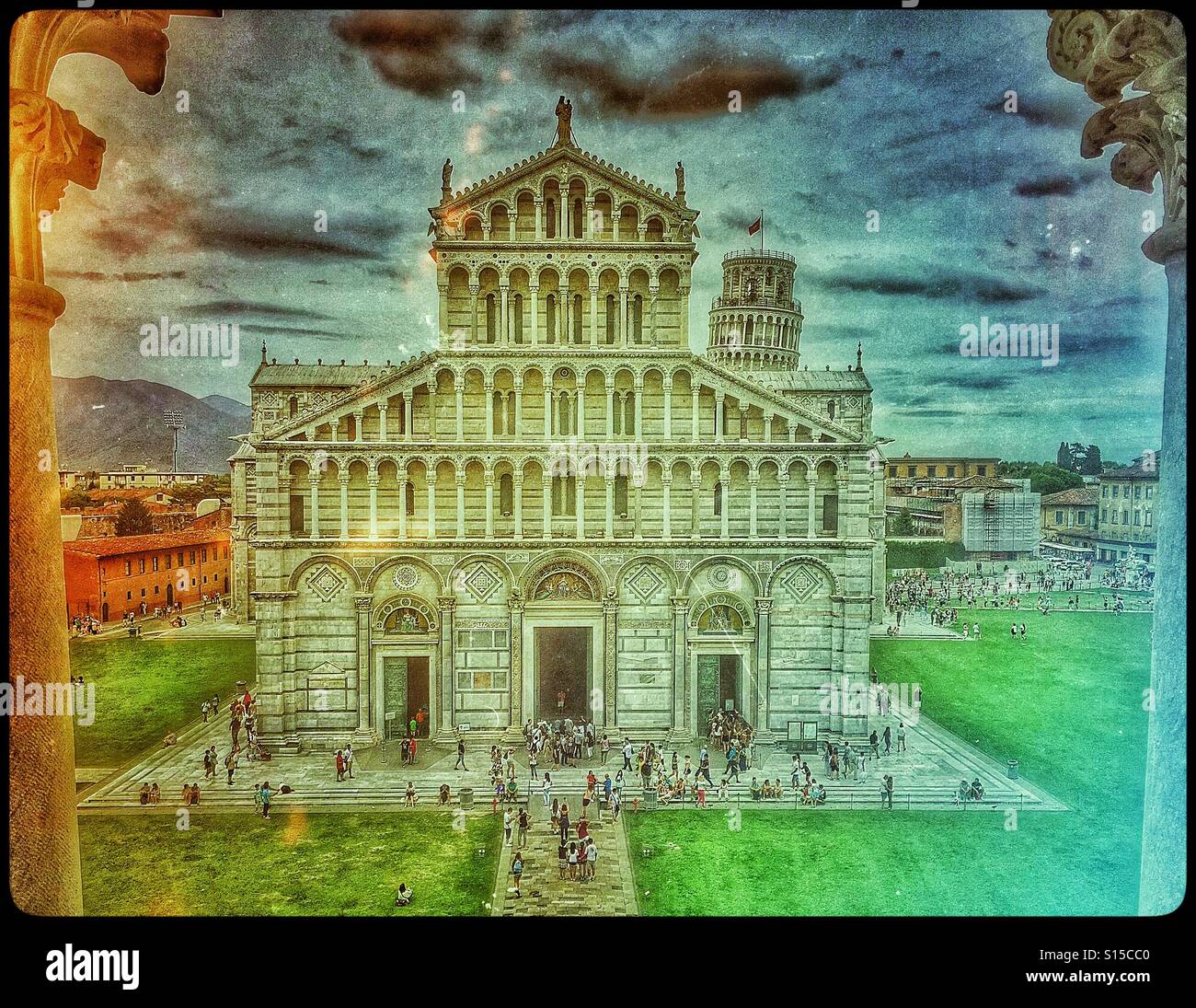 A retro effect, analogue film, view of Santa Maria Assunta (St. Mary of the Assumption) from The Baptistery in The Field of Miracles, Pisa, Tuscany, Italy. Photo Credit - © COLIN HOSKINS. - Smartphone Captured Stock Image