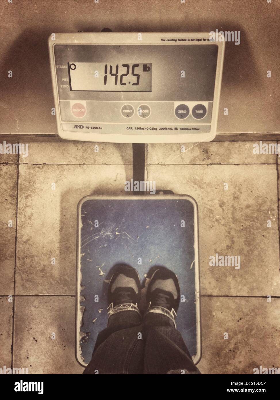 Standing on a scale - Smartphone Captured Stock Image