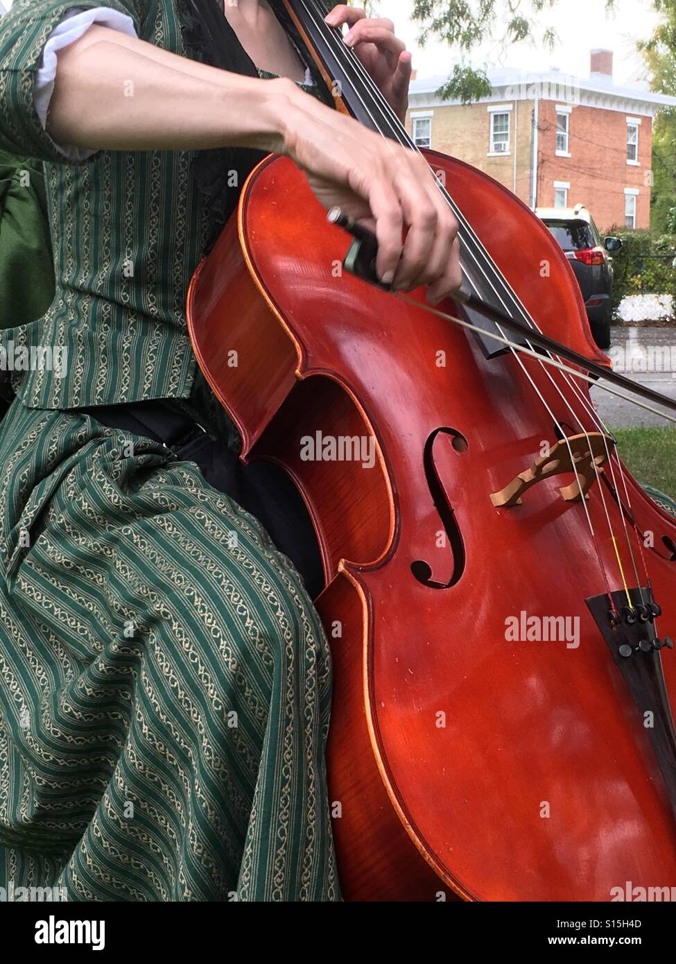 Women playing cello Stock Photo