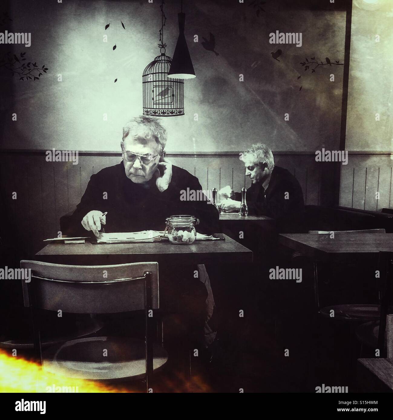 Two lone diners - Smartphone Captured Stock Image