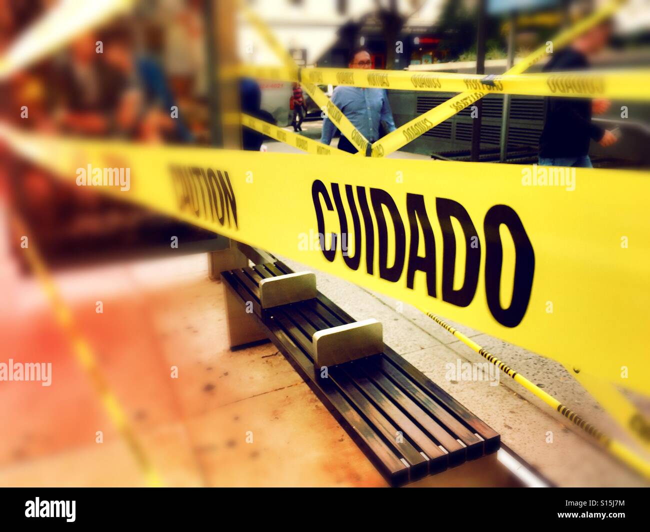 Caution tape in English and Spanish, NYC Stock Photo Alamy