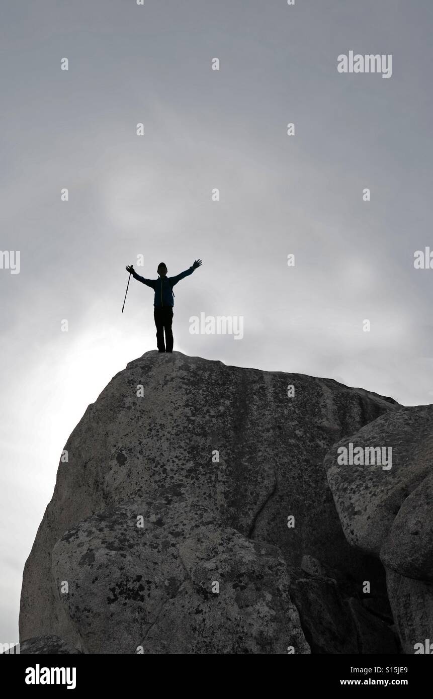 A man on the top of mountain. Stock Photo