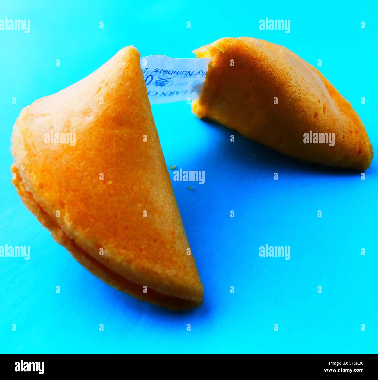 A broken fortune cookie Stock Photo Alamy