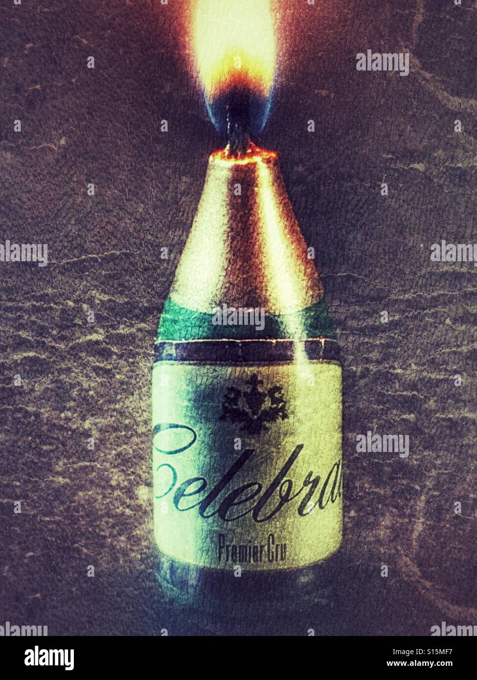 Celebrate! champagne bottle candle - Smartphone Captured Stock Image