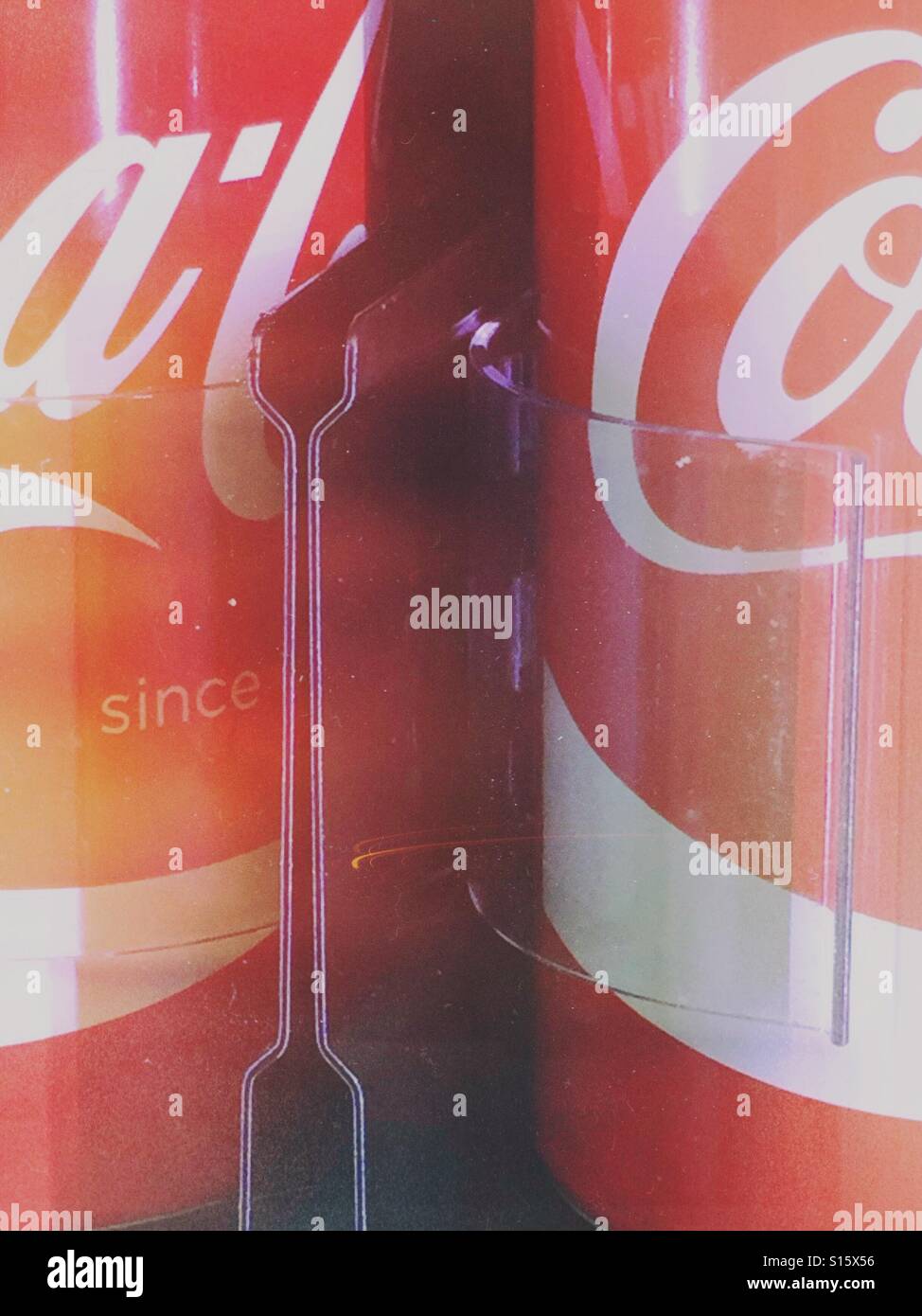 Coca-Cola cans in vending machine - Smartphone Captured Stock Image