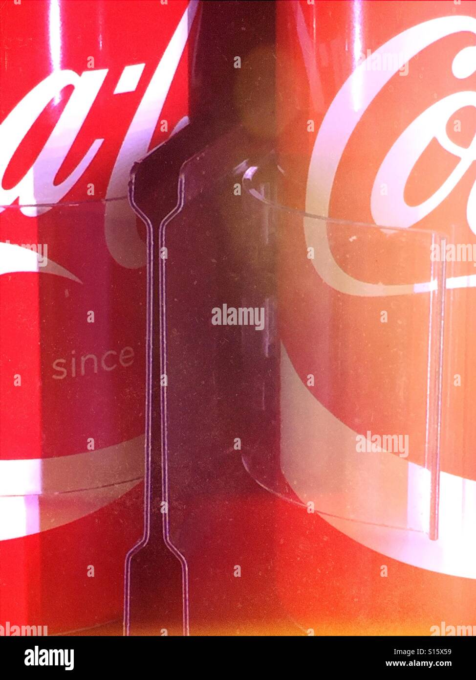 Coca-Cola cans in vending machine - Smartphone Captured Stock Image
