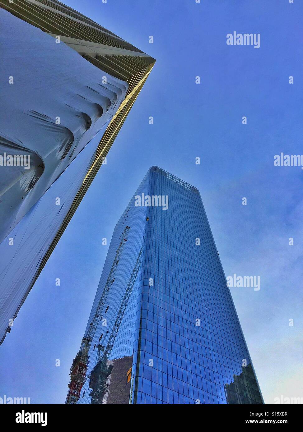 High rises under construction, Calgary, Alberta,Canada,corners - Smartphone Captured Stock Image