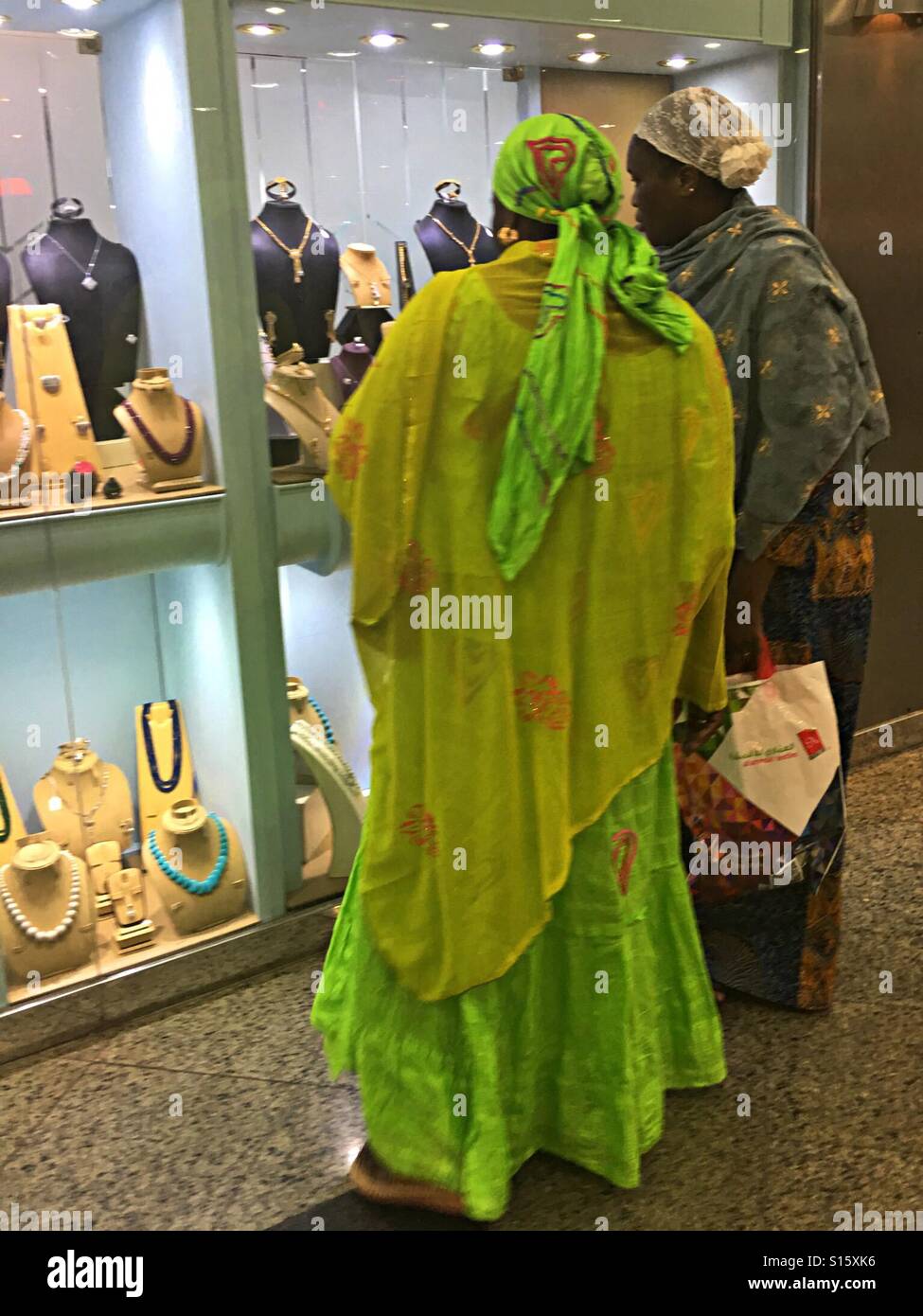 African women window shopping in Jeddah, Saudi Arabia Stock Photo