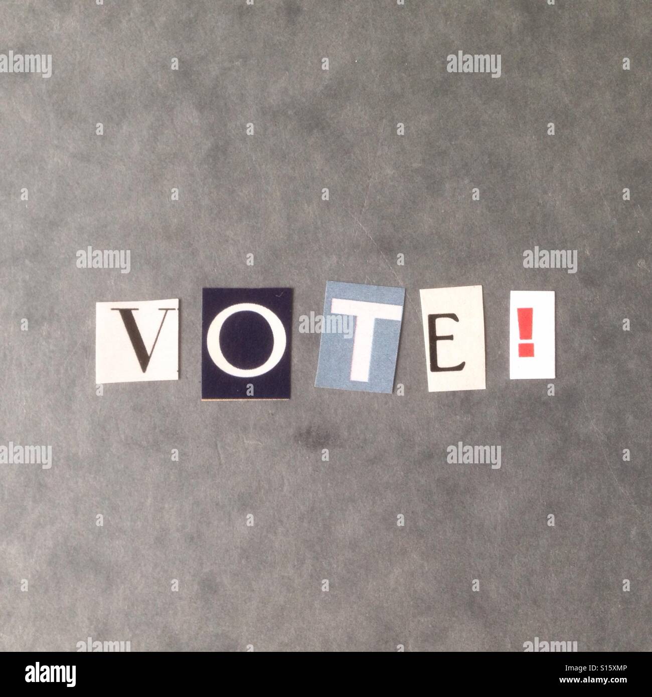 The word Vote written with newspaper cutout letters - Smartphone Captured Stock Image