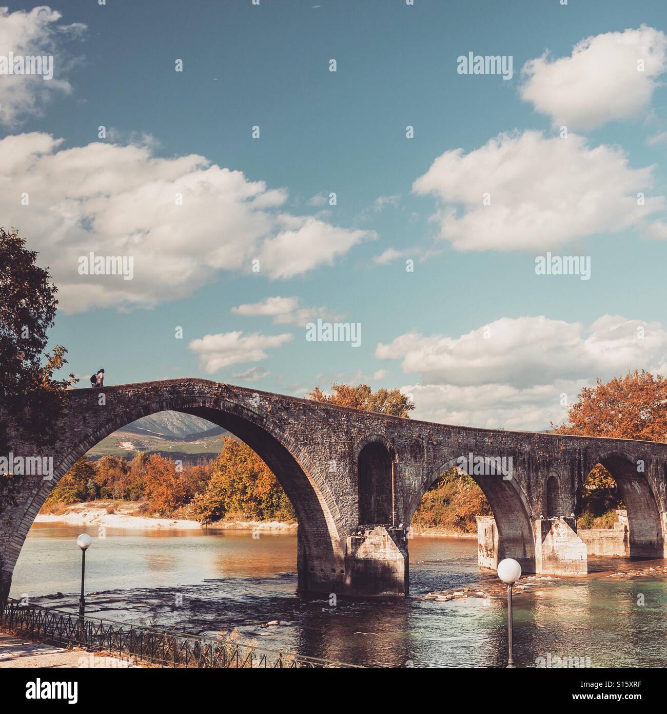 The stone bridge of Arta, the most legendary bridge in Greece. - Smartphone Captured Stock Image