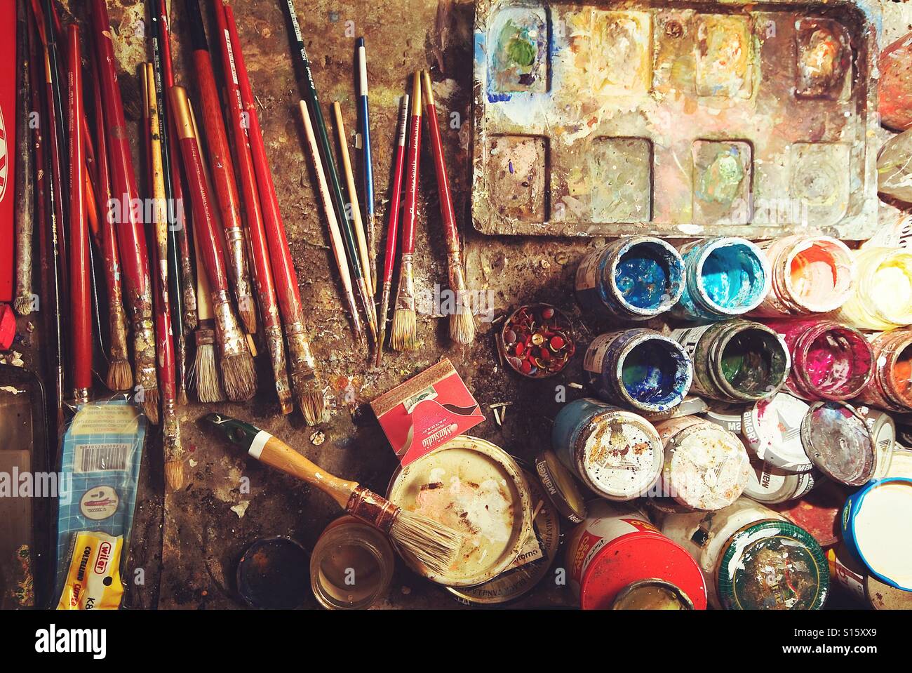 Painter’s Table – Artistic Mess with Paint Palette and Creative Tools - Smartphone Captured Stock Image