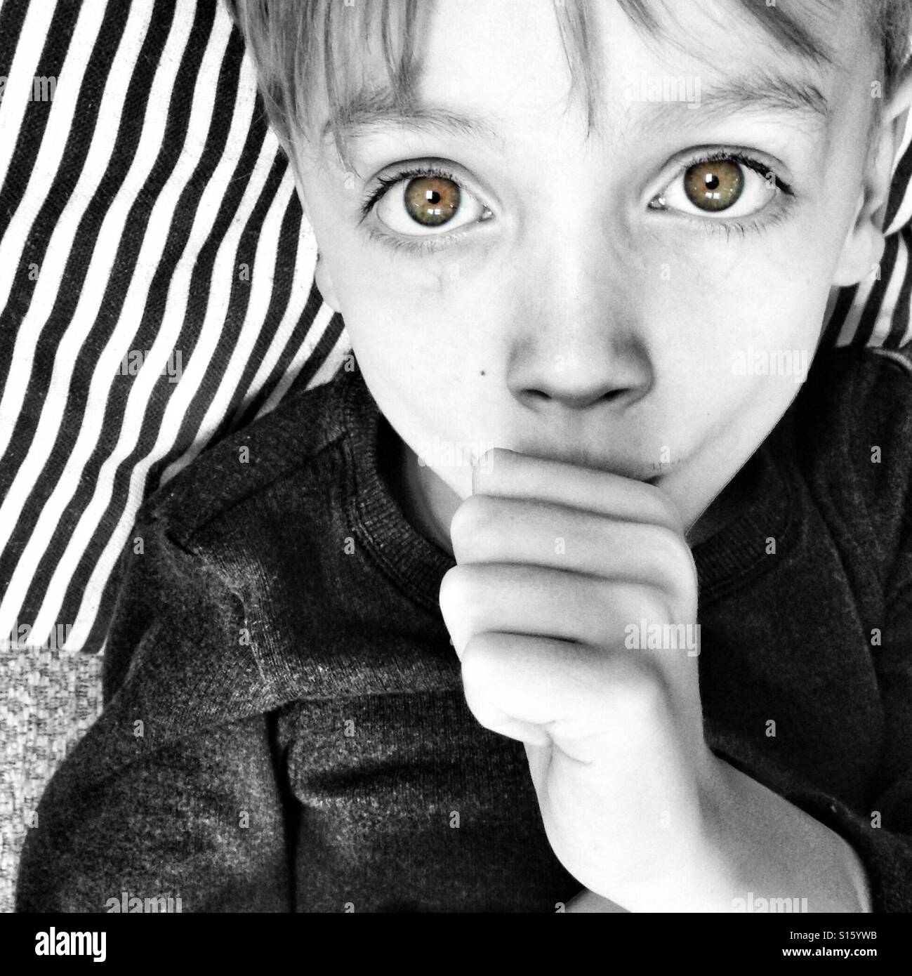 Child sucking his thumb - Smartphone Captured Stock Image