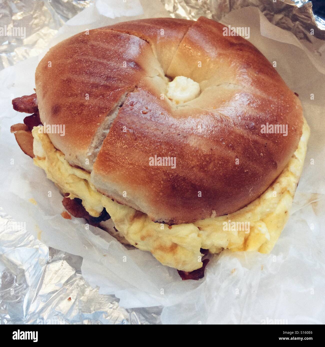 New York bacon egg and cheese toasted bagel. New York, United States of America. Stock Photo