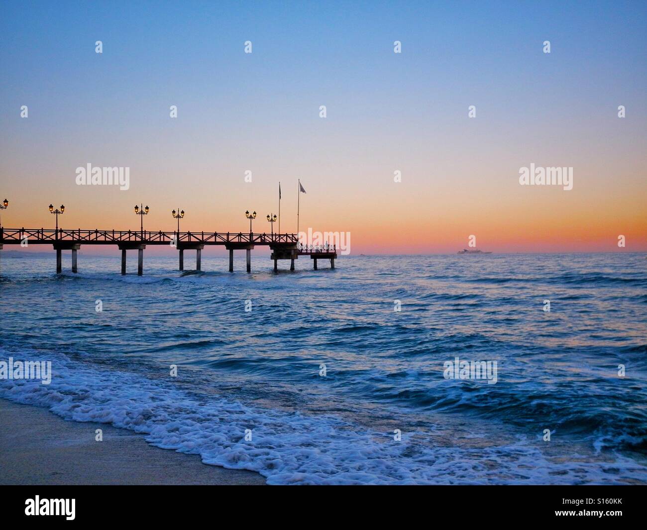 Sunset in Marbella, Spain Stock Photo - Alamy