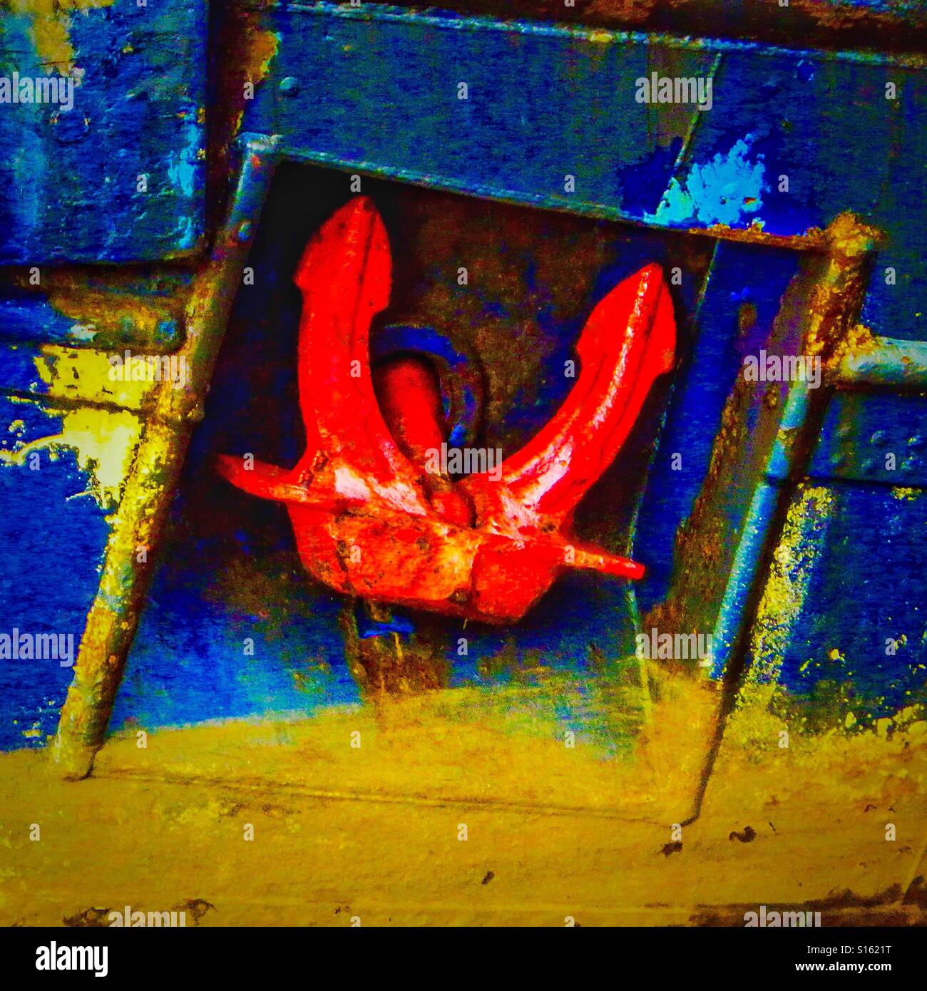Red anchor and blue hull on an old ship, Irvine harbour, Ayrshire, Scotland - Smartphone Captured Stock Image