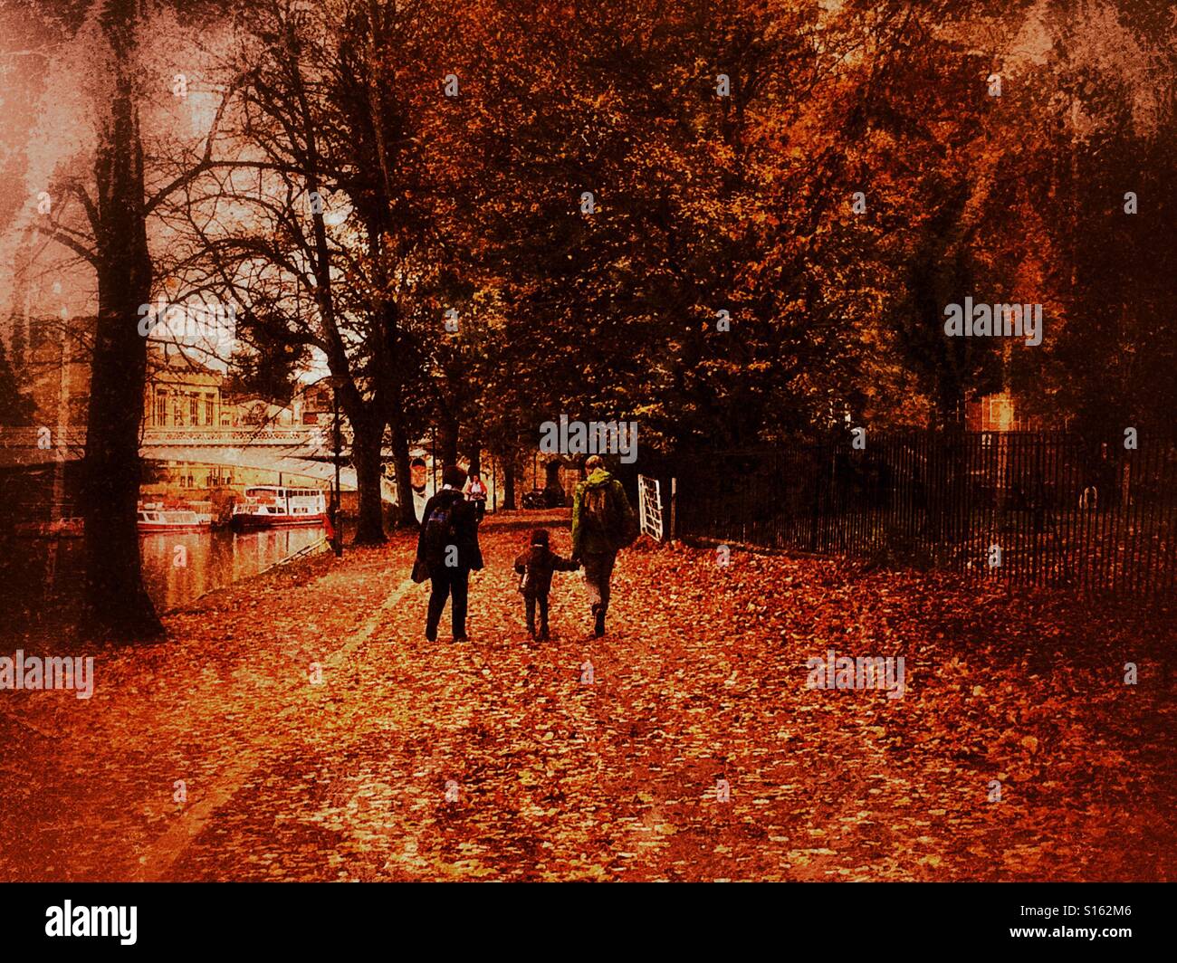 People walking along footpath in autumn England UK - Smartphone Captured Stock Image