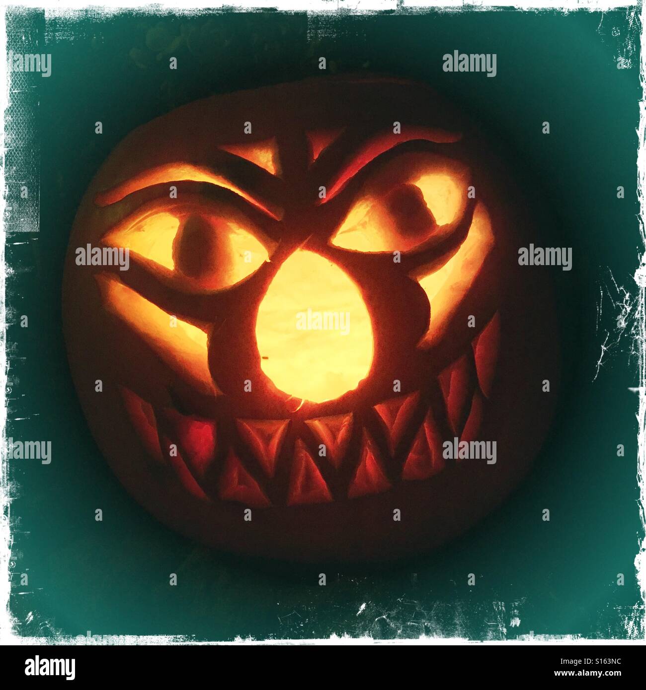 Halloween face on a pumpkin Stock Photo