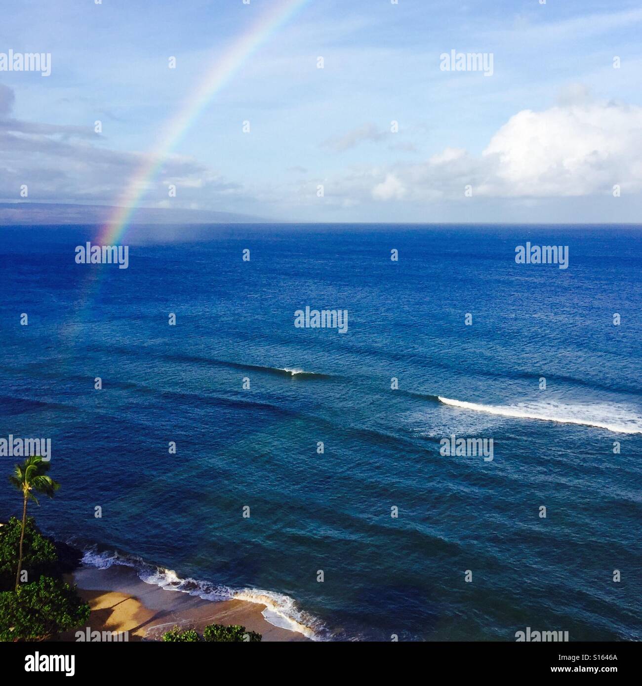 Rainbow over the pacific ocean. Kāʻanapali, Maui Hawaii. - Smartphone Captured Stock Image