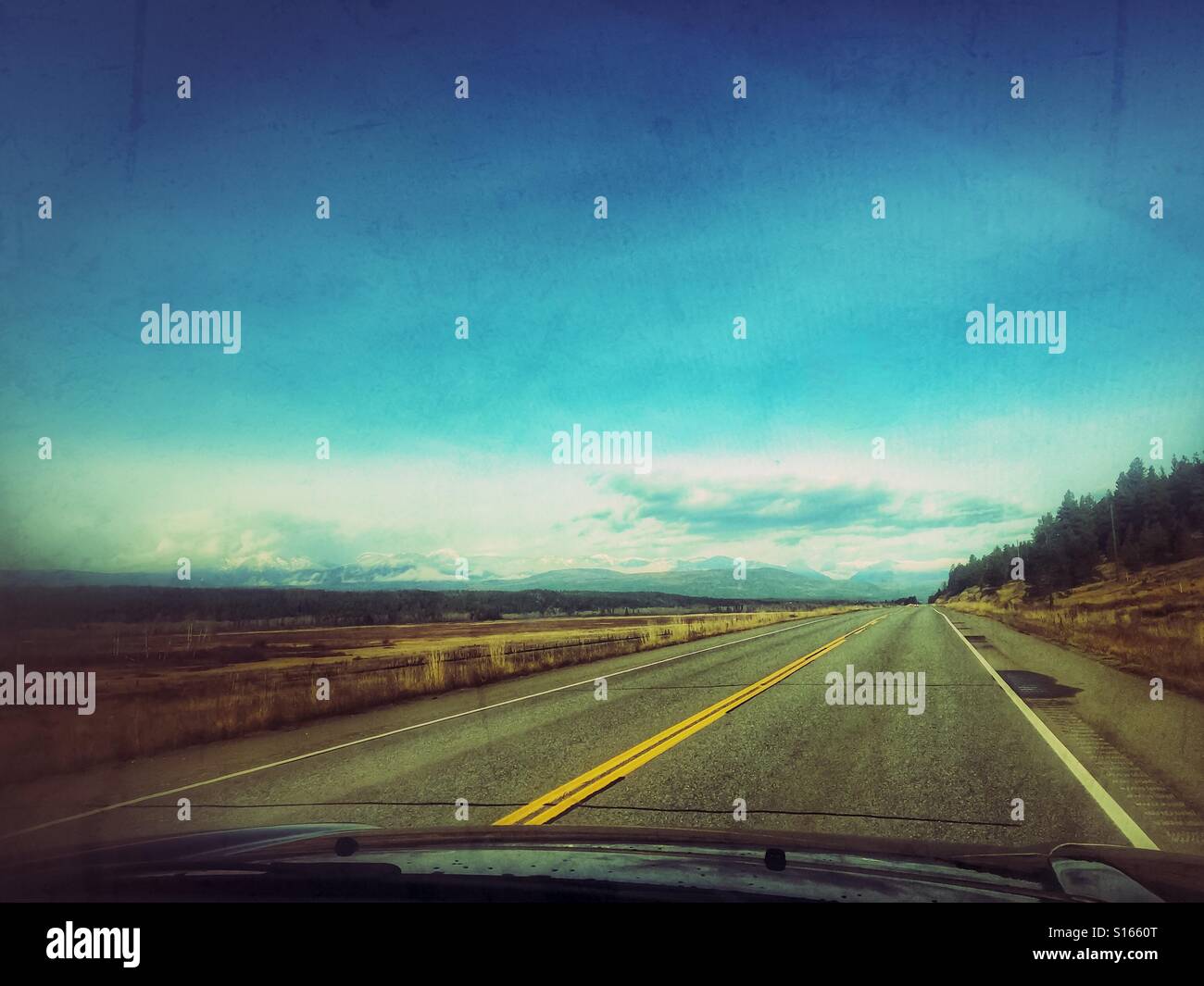 Highway driving on a sunny autumn day. - Smartphone Captured Stock Image