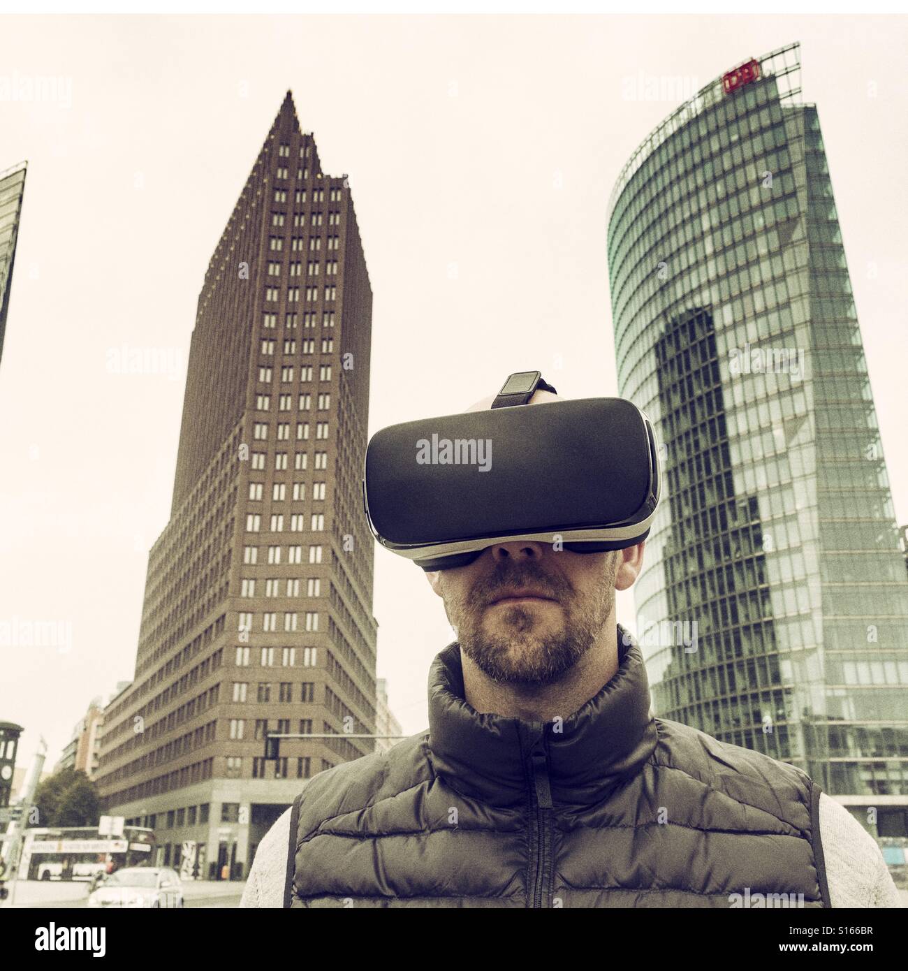 Man wearing VR virtual reality headset in Berlin - Smartphone Captured Stock Image