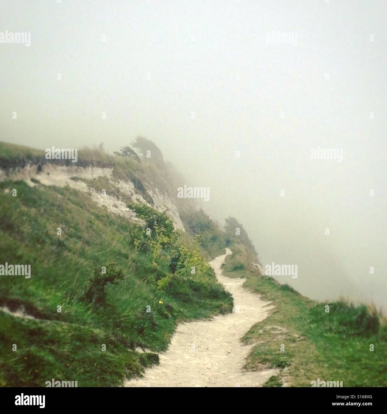 Misty Cliffside Stock Photo