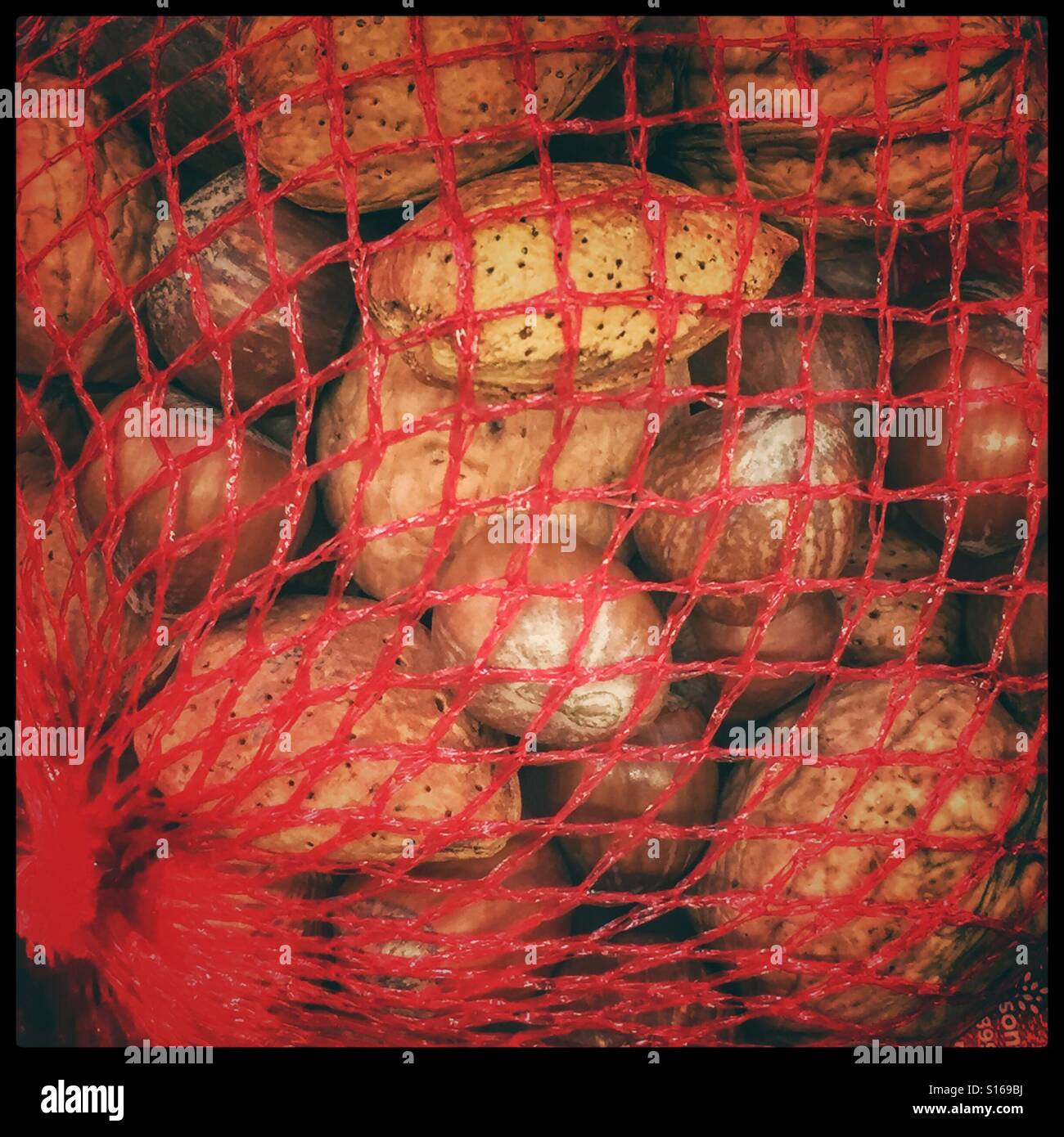 Mixed nuts in a bag Stock Photo Alamy