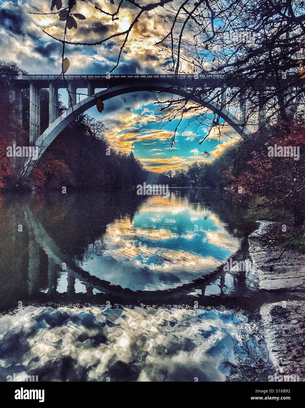 Road bridge reflected in the Aare river at dusk, Bern, Switzerland - Smartphone Captured Stock Image
