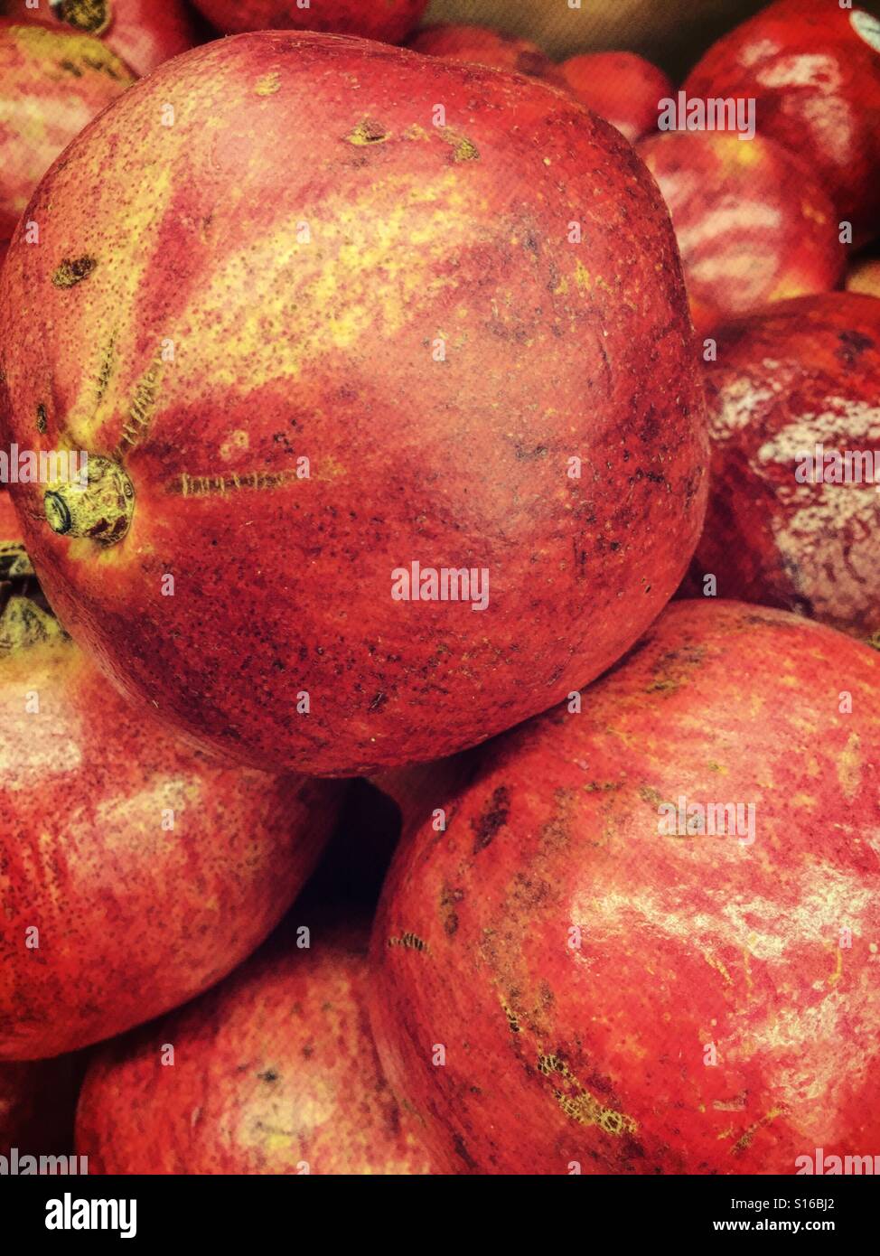 Pomegranates in a basket, close up in detail - Smartphone Captured Stock Image